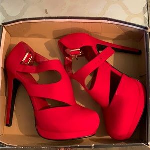 Speed Limit 98 Red stiletto heels.
